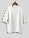 Calmera Essential Oversized Tee Chalk White – front view on hanger