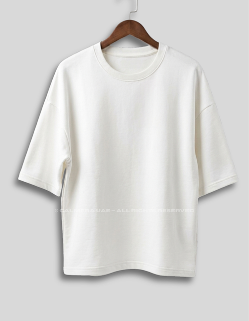 Calmera Essential Oversized Tee Chalk White – front view on hanger